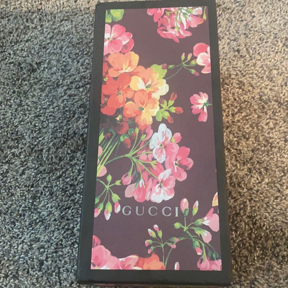 Gucci slides, never worn.